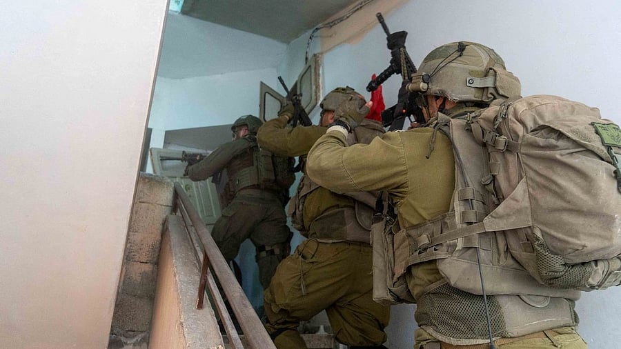 <div class="paragraphs"><p>Israeli soldiers operate in Gaza, amid the ongoing conflict between Israel and the Palestinian Islamist group Hamas, in this handout picture released on March 21, 2024. </p></div>