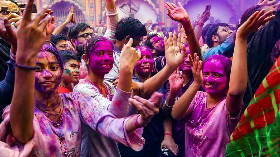 <div class="paragraphs"><p>Devotees celebrate with colours during Holi celebration in Mathura.</p></div>