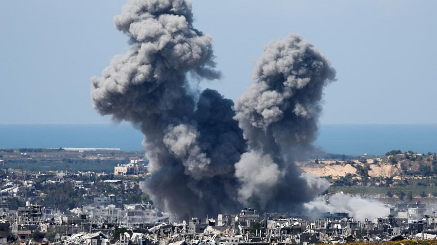 <div class="paragraphs"><p>Smoke rises from Gaza during an explosion following an airstrike, as seen from Israel.</p></div>
