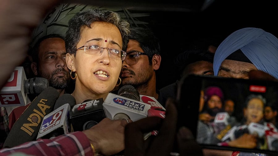 <div class="paragraphs"><p>Delhi Minister Atishi Singh outside the residence of Delhi Chief Minister Arvind Kejriwal after an ED team arrived there, shortly after the high court refused to grant Kejriwal protection from coercive action in an excise policy-linked money laundering case, in New Delhi, Thursday, March 21, 2024.</p></div>