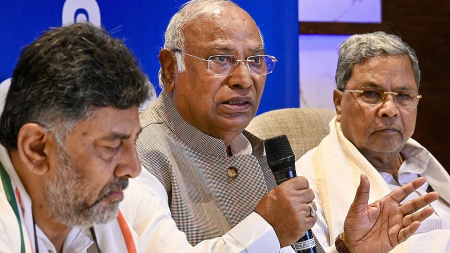 <div class="paragraphs"><p>Congress President Mallikarjun with Karnataka Chief Minister Siddaramaiah and Deputy Chief Minister D K Shivakumar.&nbsp;</p></div>