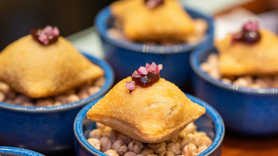 <div class="paragraphs"><p>A deconstructed version of Chole Bhature is served as chana masala hummus filled within a bhatura pocket. </p></div>