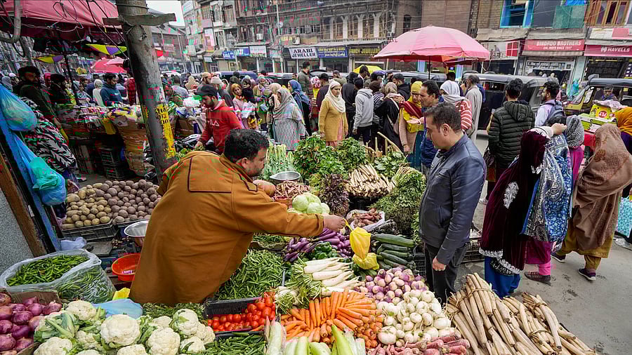 <div class="paragraphs"><p>People shop at a market  in Srinagar, Monday, March 11, 2024.</p></div>