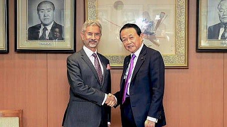 <div class="paragraphs"><p>External Affairs Minister S. Jaishankar with Japan's Liberal Democratic Party Vice President Taro Aso during a meeting, in Japan.</p></div>