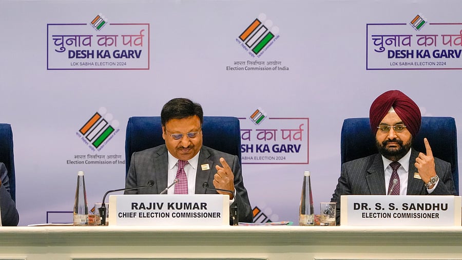 <div class="paragraphs"><p>Chief Election Commissioner Rajiv Kumar and SS Sandhu gestures during announcement of the schedule for General Elections 2024, in New Delhi, Saturday, March 16, 2024. </p></div>