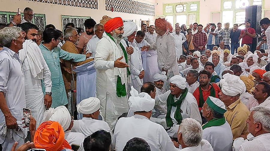<div class="paragraphs"><p>Bharatiya Kisan Union leader Rakesh Tikait with other union leaders during a 'Khap Mahapanchayat' to deliberate on the next steps to be taken in the agitation pertaining to the ongoing wrestlers' issue, in Kurukshetra, Friday, June 2, 2023.</p></div>
