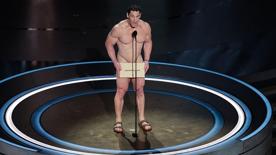 <div class="paragraphs"><p>John Cena on stage during the presentation of the Oscar for Costume Design on stage during the Oscars show at the 96th Academy Awards in Hollywood.</p></div>