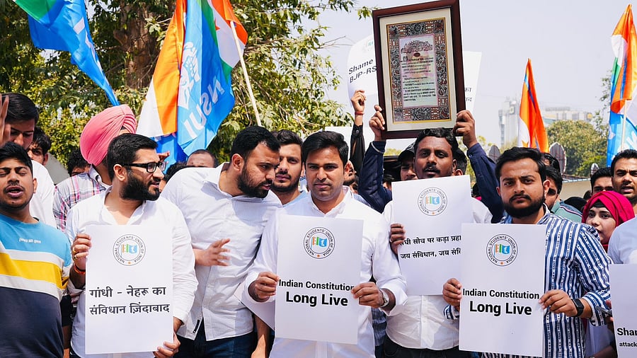 <div class="paragraphs"><p>National Students' Union of India in a protest against BJP MP Anant Kumar Hegde for his remarks on 'amending the Constitution' and demanded that a case be registered against him.</p></div>