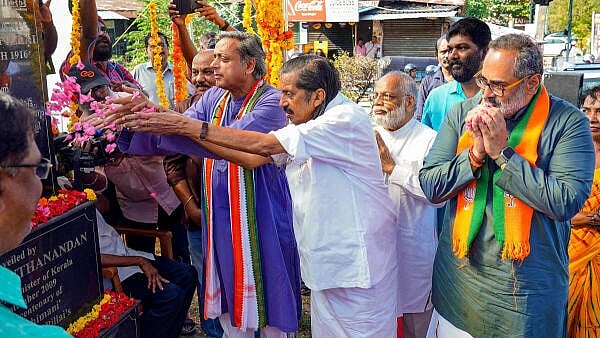 <div class="paragraphs"><p>Union Minister &amp; BJP candidate Rajeev Chandrasekhar, LDF candidate Pannyan Raveendran (c) and UDF candidate Shashi Tharoor pay floral tribute to political activist Swadeshabhimani Ramakrishna Pillai, in Thiruvananthapuram, Thursday, March 28, 2024.</p></div>