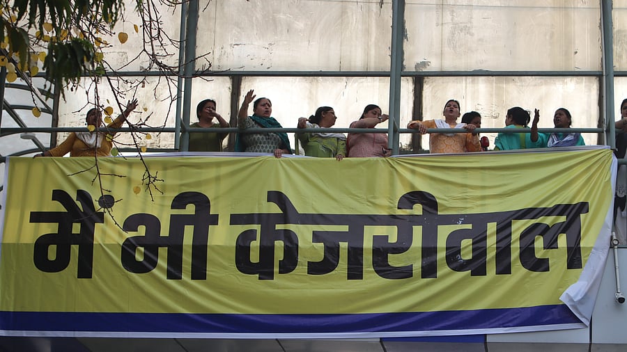 <div class="paragraphs"><p>AAP workers and supporters raise slogans during a protest over the arrest of Delhi Chief Minister Arvind Kejriwal in connection with an excise policy-linked money-laundering case, at ITO in New Delhi, Sunday.</p></div>