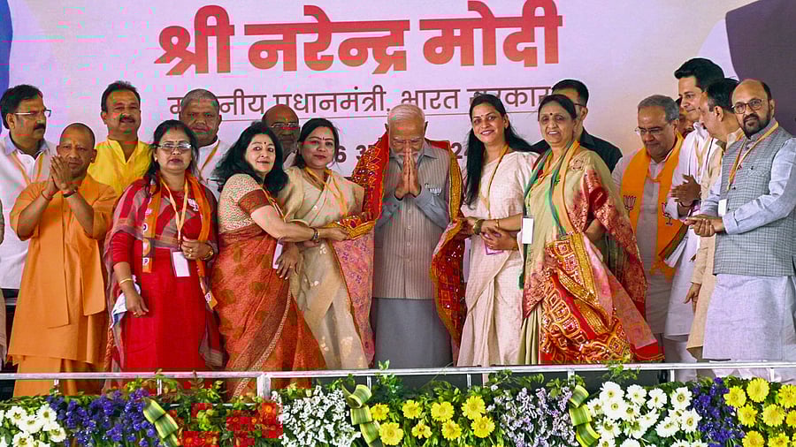 <div class="paragraphs"><p>Prime Minister Narendra Modi during a public meeting, ahead of Lok Sabha elections, in Saharanpur, Saturday, April 6, 2024. UP Chief Minister Yogi Adityanath is also seen.</p></div>