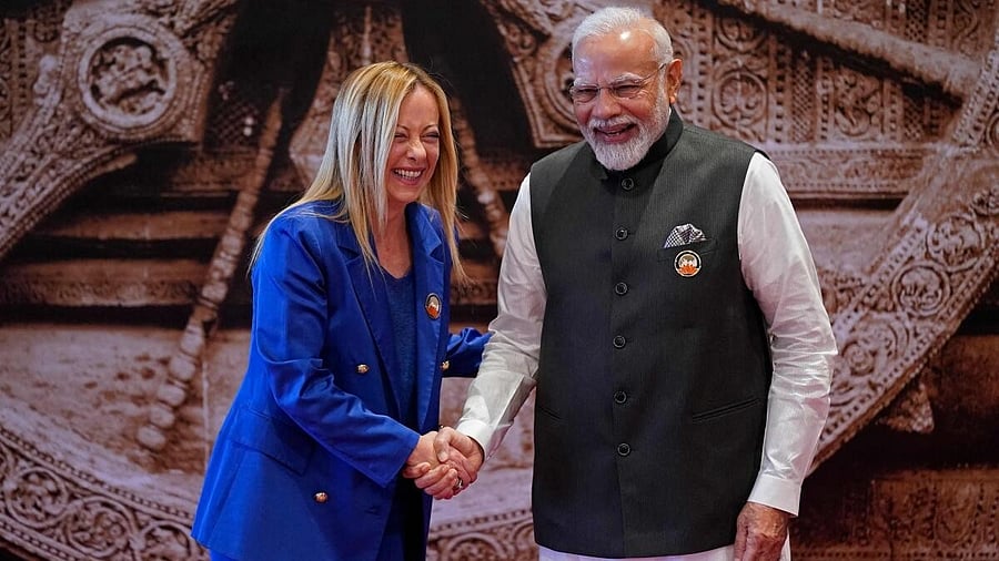 <div class="paragraphs"><p>PM Modi shares a candid moment with Italian counterpart Giorgia Meloni.</p></div>