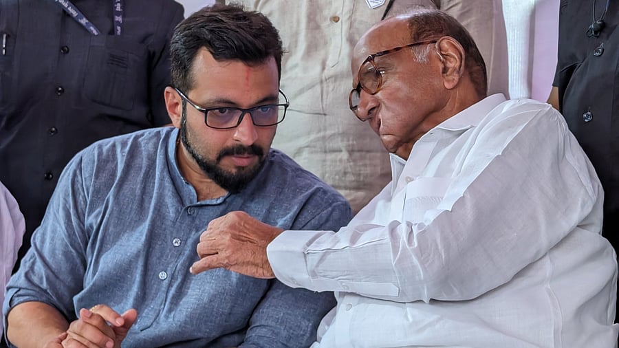 <div class="paragraphs"><p>File photo of Amol Kolhe with&nbsp;Sharad Pawar</p></div>