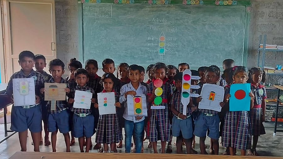 <div class="paragraphs"><p>Children display their art work at the school in Mysuru district.</p></div>