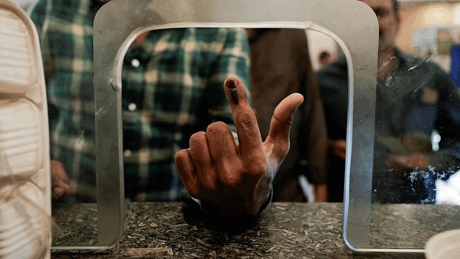 <div class="paragraphs"><p>People cast their votesduring the second phase of general election in India.</p></div>