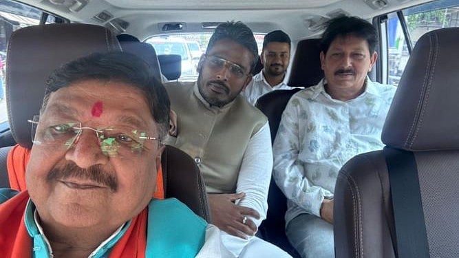 <div class="paragraphs"><p>BJP leader&nbsp;Kailash Vijayvargiya with&nbsp;Congress nominee from Madhya Pradesh's Indore Lok Sabha constituency— Akshay Kanti Bam.</p></div>