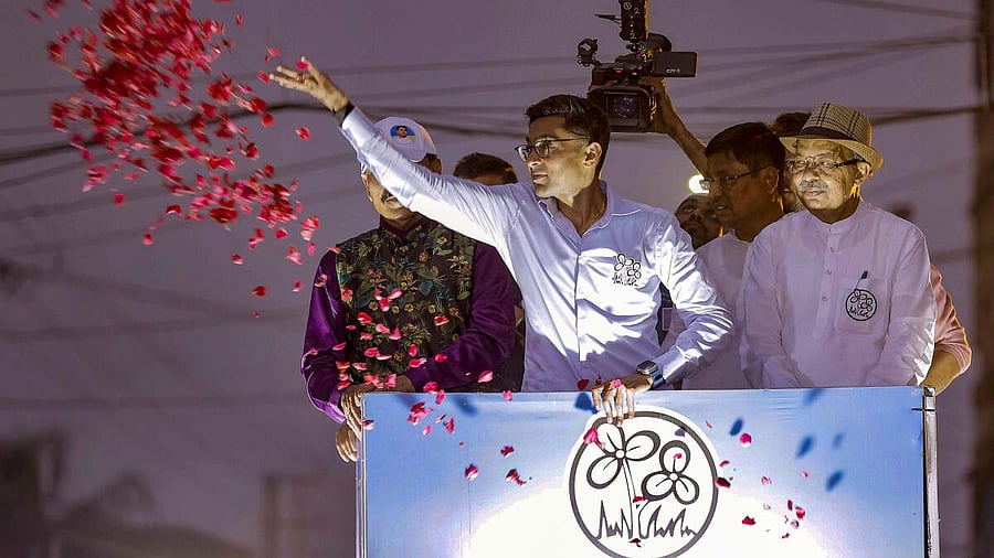 <div class="paragraphs"><p>Abhishek Banerjee (left) during a rally in support of party's candidate from Howrah Prasun Banerjee in Howrah.</p></div>