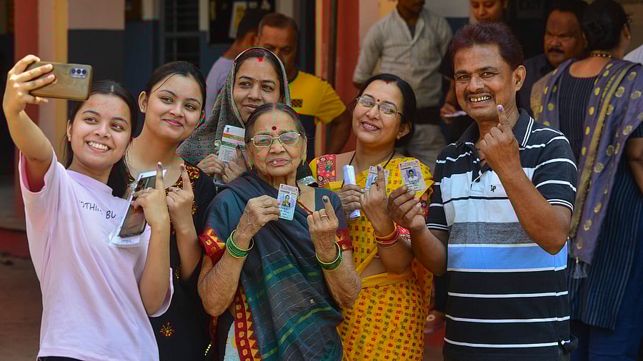 <div class="paragraphs"><p>Voters take selfie after casting their vote for the first phase of Lok Sabha elections, in Jabalpur, Friday.</p></div>