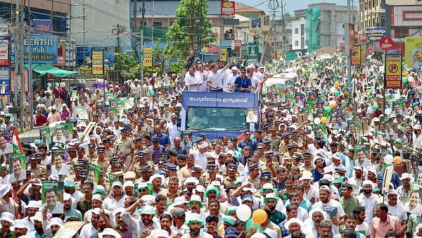 <div class="paragraphs"><p>Congress candidate Rahul Gandhi during a road show before filing his nomination papers for the upcoming Lok Sabha elections, in Wayanad district, Wednesday, April 3, 2024.</p></div>