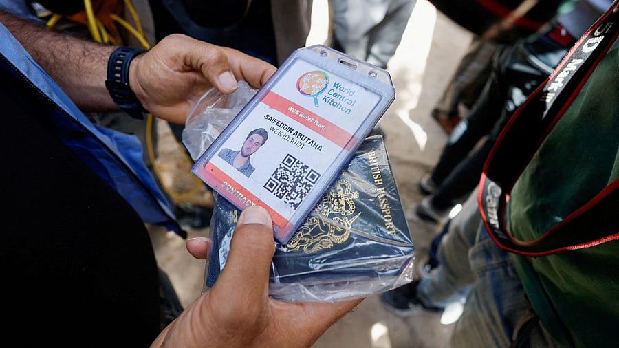 <div class="paragraphs"><p>A person holds a document of aid worker Saifeddin Issam Ayad Abutaha, who was killed in an Israeli strike along with other foreign workers from the World Central Kitchen  in an Israeli strike.</p></div>