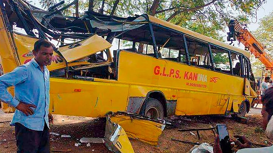 <div class="paragraphs"><p>Narnaul: Locals near a damaged school bus after an accident near Mahendragarh, in Narnaul district, Haryana, Thursday, April 11, 2024. At least six school children were killed and around 20 sustained injuries in the accident, according to police. </p></div>