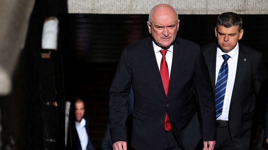 <div class="paragraphs"><p>Newly appointed Bulgarian caretaker Prime Minister Dimitar Glavchev walks towards the government building for a handover ceremony in Sofia, Bulgaria,</p><p><br></p></div>