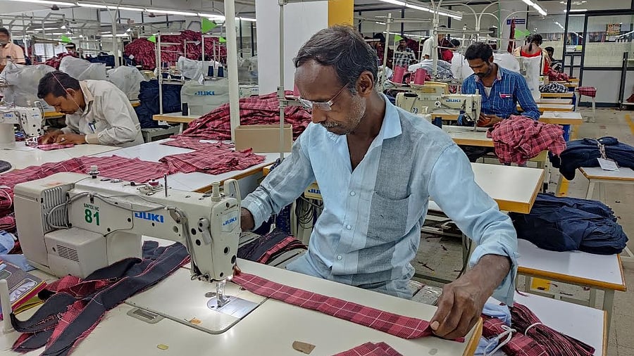 <div class="paragraphs"><p>Workers at a knitwear manufacturing unit in Tiruppur</p></div>