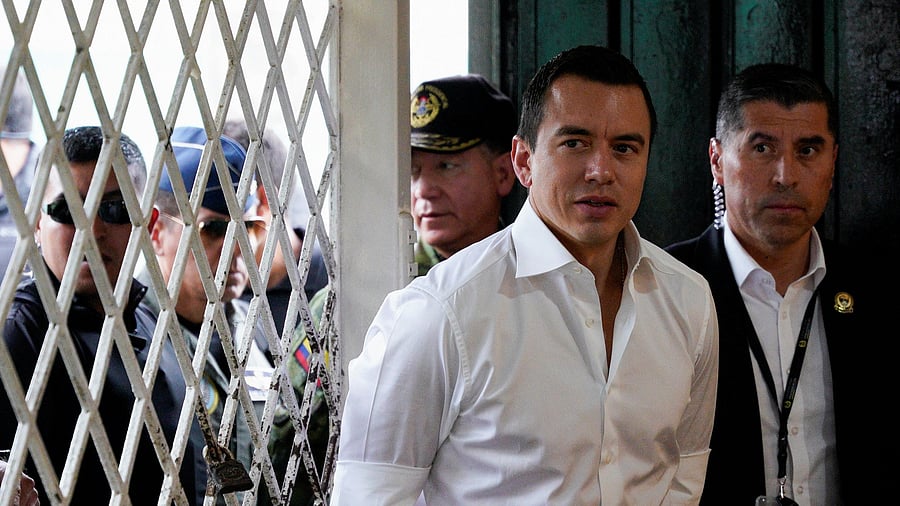 <div class="paragraphs"><p>Ecuador's President Daniel Noboa looks on as his wife Lavinia Valbonesi  takes part in a referendum that asks voters to support mostly security-related questions to fight rising violence, in Guayaquil, Ecuador April 21, 2024. </p></div>