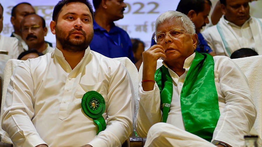 <div class="paragraphs"><p>File photo of RJD chief Lalu Prasad with party leader Tejashwi Yadav.</p></div>