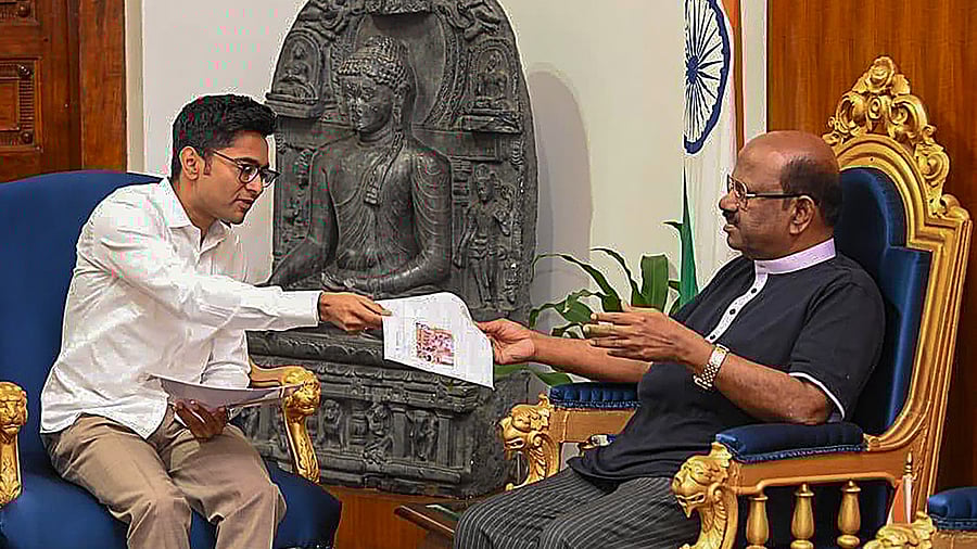 <div class="paragraphs"><p>West Bengal Governor CV Ananda Bose during a meeting with TMC's National General Secretary Abhishek Banerjee.</p></div>