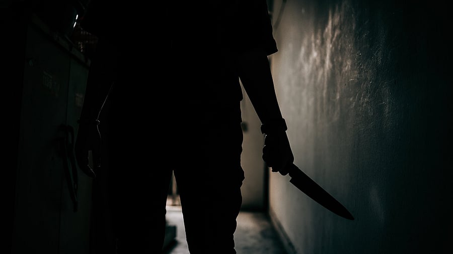 <div class="paragraphs"><p>Representative image of a person with a knife.</p></div>