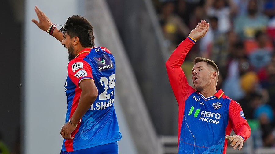 <div class="paragraphs"><p>Delhi Capital's Ishant Sharma seen here with teammate David Warner at the Maharaja Yadavindra Singh International Cricket Stadium, in Mohali</p></div>