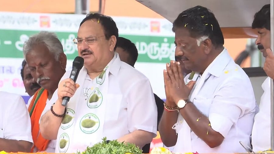 <div class="paragraphs"><p>BJP national president J P Nadda with former Tamil Nadu Chief Minister O Panneerselvam at a roadshow in Tamil Nadu's Paramakudi, on April 16, 2024.</p></div>