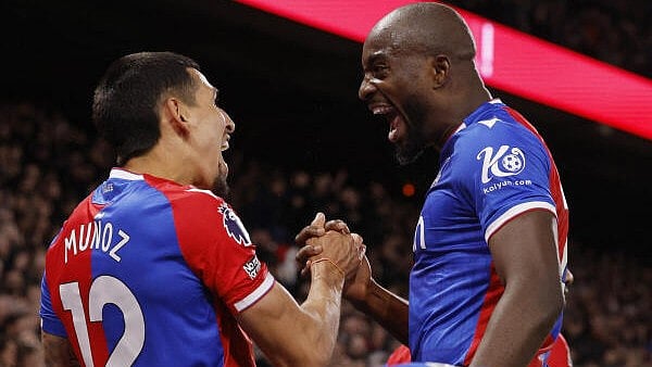 <div class="paragraphs"><p>Crystal Palace's Jean-Philippe Mateta celebrates scoring their second goal with Daniel Munoz</p></div>