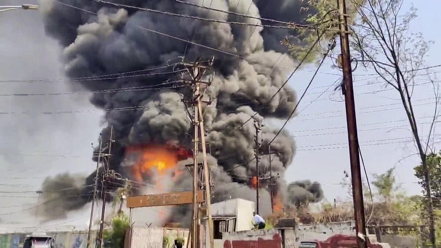 <div class="paragraphs"><p>Smoke rises after a massive fire broke at a factory, in Raipur. </p></div>