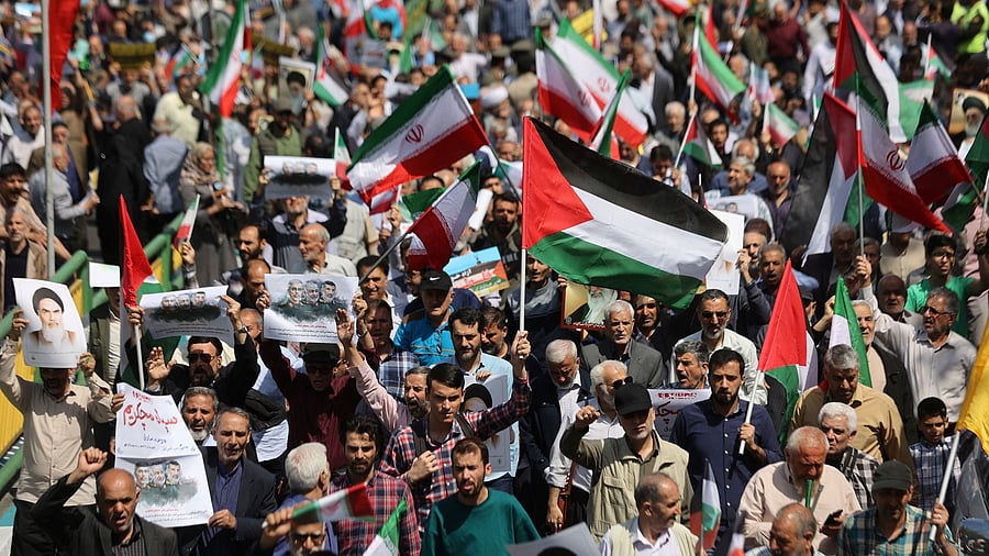 <div class="paragraphs"><p>Iranians attend an anti-Israel rally in Tehran, Iran.</p></div>