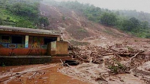 <div class="paragraphs"><p>File photo showing landslides that claimed 10 lives in Karimganj and Hailakandi districts in Barak Valley, in 2022.</p></div>