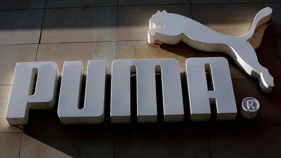 <div class="paragraphs"><p>The logo of German sports goods firm Puma is seen at the entrance of one of its stores in Vienna, Austria, March 18, 2016. </p></div>