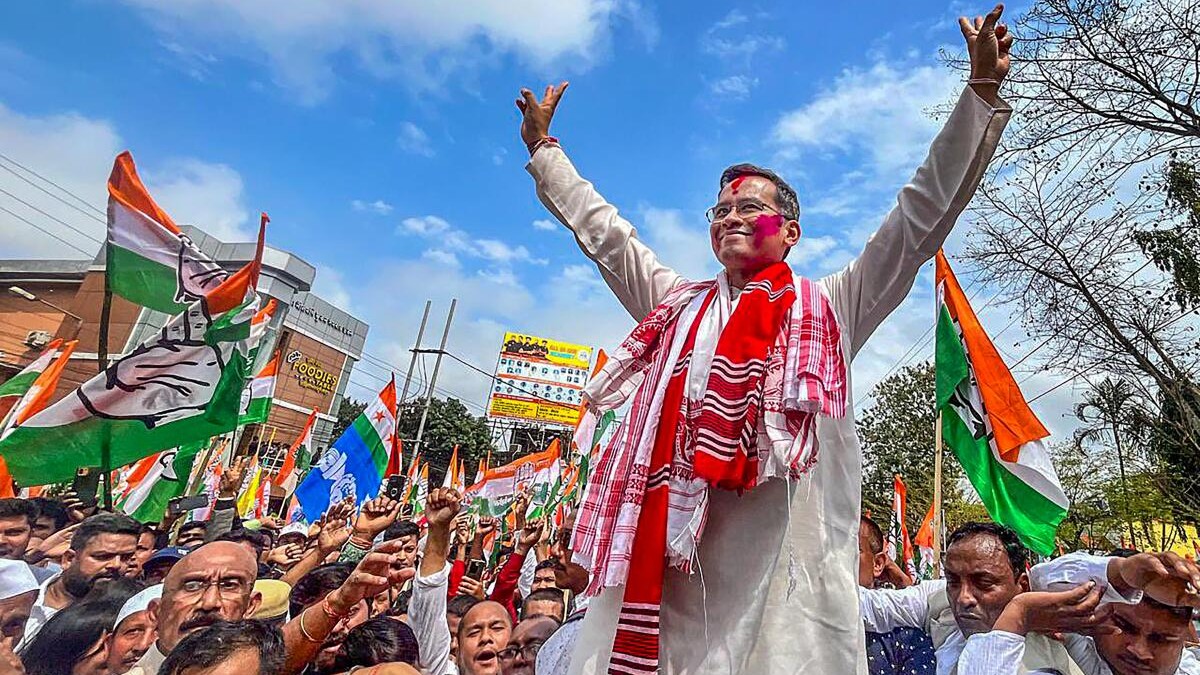 <div class="paragraphs"><p>Congress leader Gaurav Gogoi acknowledges supporters during a procession before filing his nomination from the Jorhat constituency for the upcoming Lok Sabha election. </p></div>