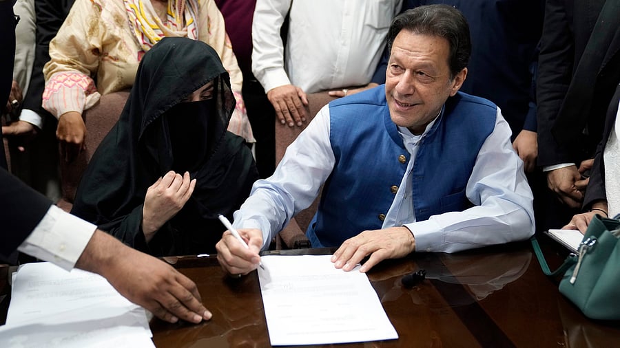 <div class="paragraphs"><p>Pakistan's former Prime Minister Imran Khan, and his wife Bushra Bibi.</p></div>