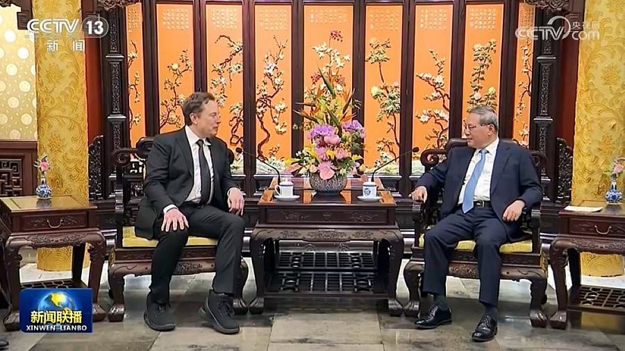 <div class="paragraphs"><p>Elon Musk with Chinese Premier Li Qiang in Beijing. </p></div>