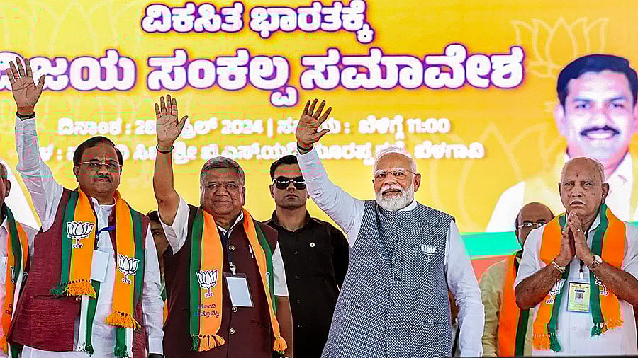 <div class="paragraphs"><p>Prime Minister Narendra Modi with BJP leaders B.S. Yediyurappa and Jagadish Shettar during a public meeting for Lok Sabha elections, in Belagavi, Sunday, April 28, 2024. </p></div>