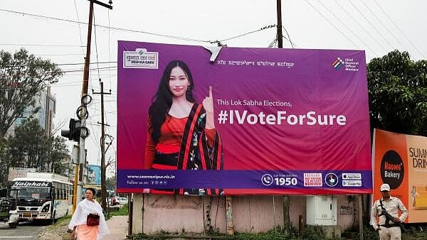 <div class="paragraphs"><p>A poster spreading awareness to vote is pictured on a street ahead of the elections in Imphal, Manipur.</p></div>