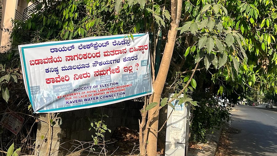 Members of Royal Lakefront Residency in JP Nagar 8th Phase put up banners, threatening to boycott the elections owing to the lack of water supply. SPECIAL ARRANGEMENT