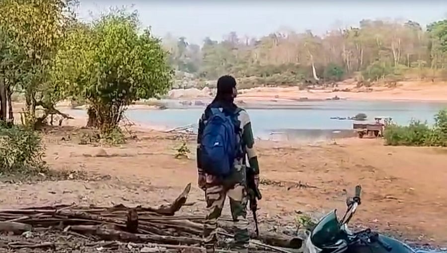 <div class="paragraphs"><p>A security personnel during an encounter with Naxalites, in Kanker district, on Tuesday.</p></div>