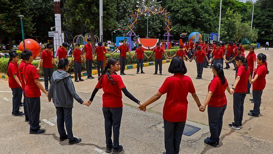 <div class="paragraphs"><p>Students stand under the sun casting negligible shadows on the 'Zero Shadow Day' at Jawaharlal Nehru Planetarium, in Bengaluru on&nbsp;August 18, 2023. </p></div>
