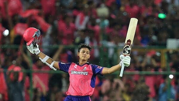 <div class="paragraphs"><p>Rajasthan Royals batter Yashasvi Jaiswal celebrates his century during the Indian Premier League (IPL) 2024 cricket match between Rajasthan Royals and Mumbai Indians, at Sawai Mansingh Stadium, in Jaipur, Monday, April 22</p></div>