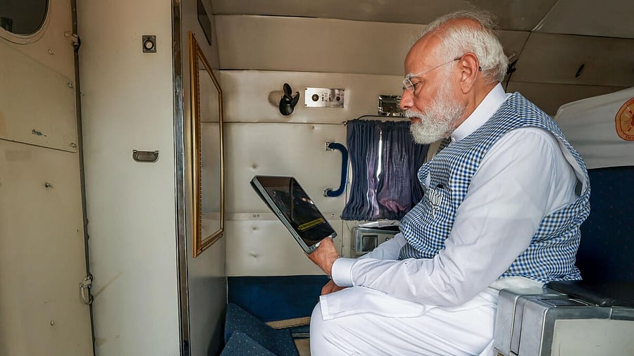 <div class="paragraphs"><p>Prime Minister Narendra Modi watches the live telecast of Surya Tilak on idol of Ram Lalla at Ayodhya's Ram temple.</p></div>