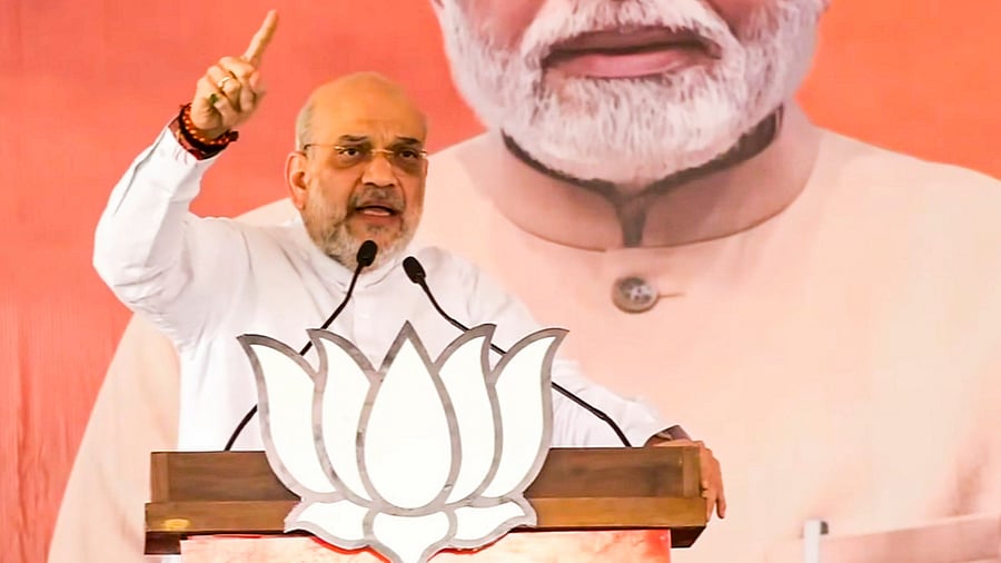 <div class="paragraphs"><p>Union Home Minister Amit Shah addresses during a public meeting for Lok Sabha polls, in Rajasthans Bhilwara, Saturday, April 20, 2024. </p></div>