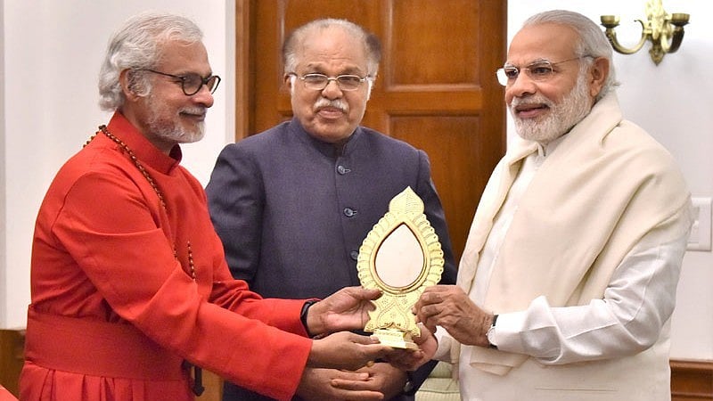 <div class="paragraphs"><p>Dr. K. P. Yohannan, Metropolitan Bishop, Believers Church, Kerala calls on PM</p></div>